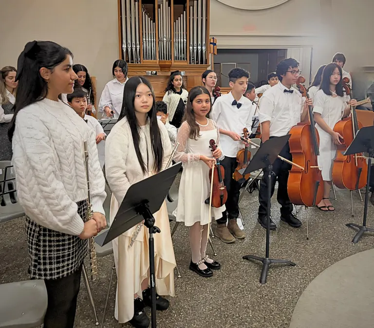 Azars' Music School students preparing for a recital