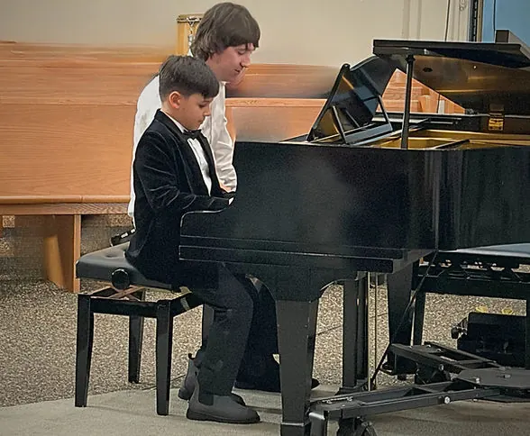 Azars' Music School student learning music